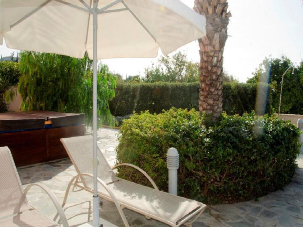 Villa Saraliana Sandy Beach Villas - Heated Pool - Jacuzzi - Private Beach Area Polis Værelse billede
